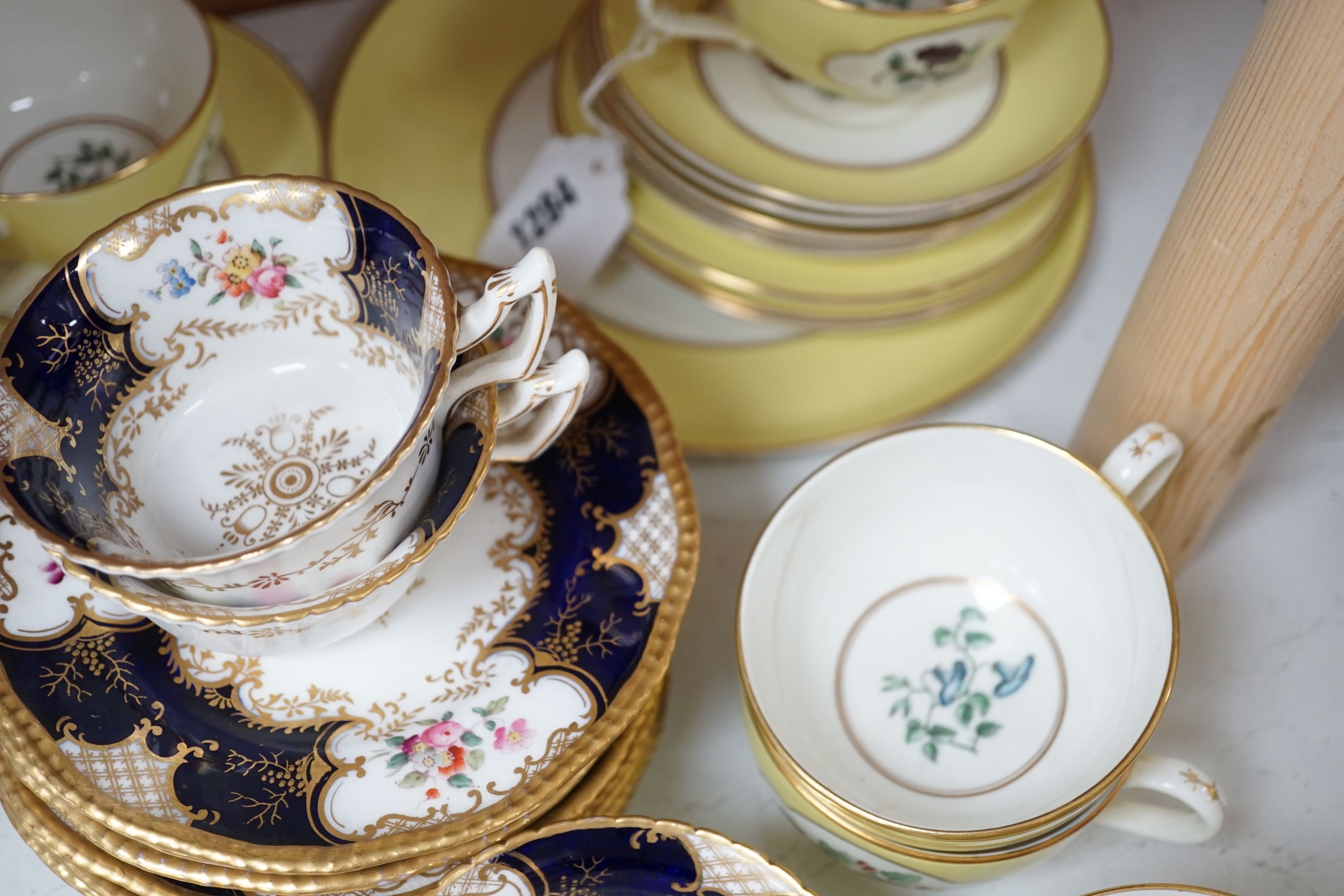 Royal Worcester for Aspreys - a set of six flower painted cups and saucers and four sideplates together with a Coalport part tea set